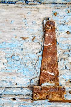 morocco in africa the old wood  facade home and rusty safe padlock 