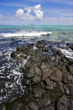 beach rock and stone in ile du cerfs mauritius