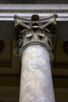 column at top in old church in the center of chiavari italy