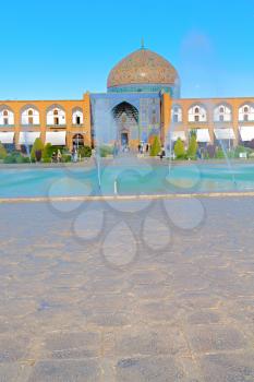 in iran old square mosque and fountain water backlight