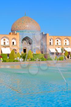 in iran old square mosque and fountain water backlight