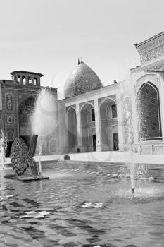 in iran the old      mosque and traditional wall tile incision near  fountain  minaret