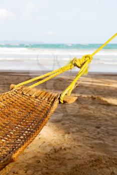 in  philippines  view from an hammock  near ocean beach and sky concept of relax
