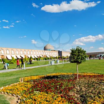 blur in iran   the old square of isfahan prople garden tree heritage tourism and mosque
