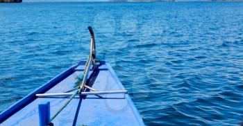 blur  in  philippines   view of the island hill from the prow of a boat