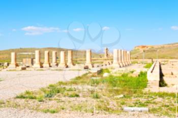  in iran   pasargad the old construction  temple and grave column blur
