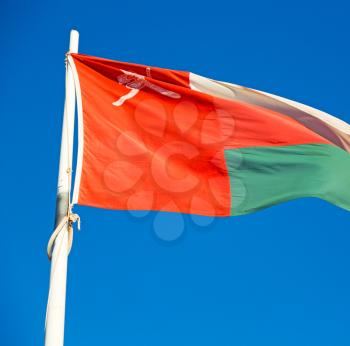 and the cloudy sky in oman waving flag 