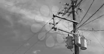 blur  in  philippines   a electric pole with transformer and wire  the cloudy sky