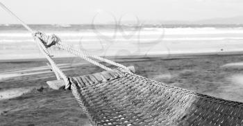 in  philippines  view from an hammock  near ocean beach and sky concept of relax
