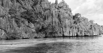 from a boat  in  philippines  snake island near el nido palawan beautiful panorama coastline sea and rock 