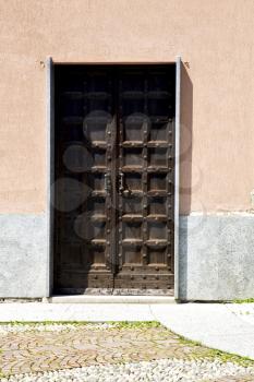 door italy  lombardy     in  the milano old   church   closed brick       pavement