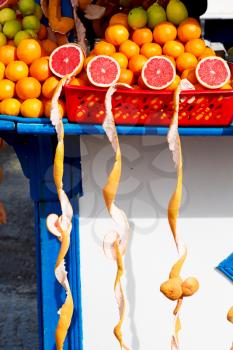 in a open market fresh fruit like orange and lemon like healty food