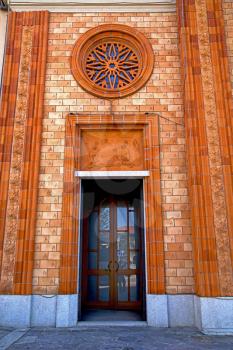  italy  lombardy     in  the vergiate  old   church  closed brick tower wall