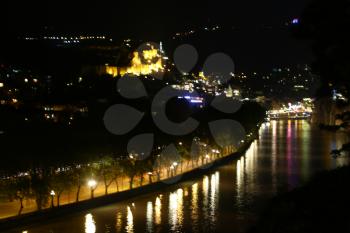 in georgia tbilisi the view of the city   near the river and old architecture in the night blur and noise
