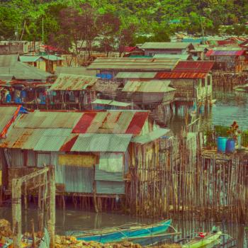 blur  philippines house in the  slum  for poor people concept of poverty and degradations
