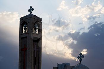 in amman jordan the chatolic church in the light of cloudy sunset