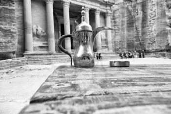 in the site of petra jordan the traditional coffe container isolated on a table