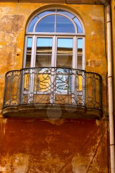 yellow  europe  italy  lombardy        in  the milano old   window closed brick      abstract grate  