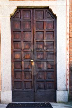 door italy  lombardy     in  the milano old   church   closed brick     pavement