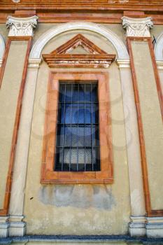  caronno varesino cross church varese italy the old rose window   and mosaic wall sunny day 