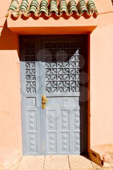olddoor in morocco  africa ancien and wall ornate brown