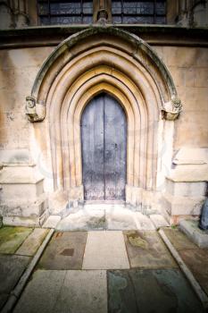 weinstmister  abbey in london old church door and marble antique  wall