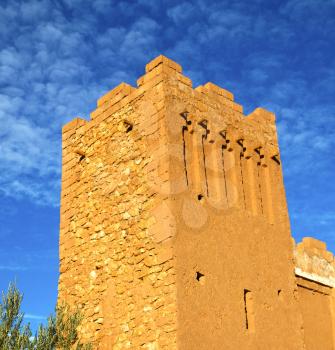 africa  in histoycal maroc  old construction  and the blue cloudy  sky