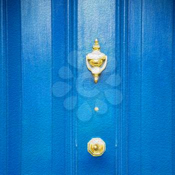  blue handle  in london antique  door  rusty  brass nail and light