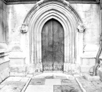 weinstmister  abbey in london old church door and marble antique  wall