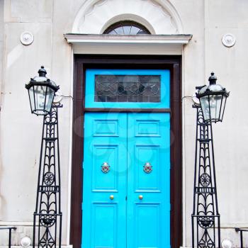  blue handle  in london antique  door  rusty  brass nail and light