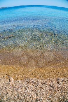 foam and froth in the sea           of mediterranean greece