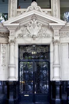 black iron old  door and  glass in a house the centre buenos aires argentina 