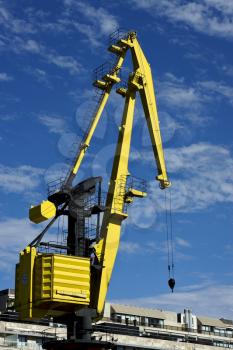 house sky clouds and yellow crane in  buenos aires argentina