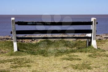 water coastline bench and summer in near the  beach rio de la plata colonia del sacramento uruguay 