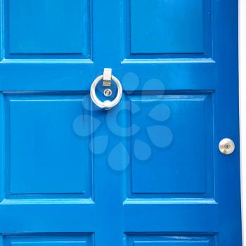  blue handle  in london antique  door  rusty  brass nail and light