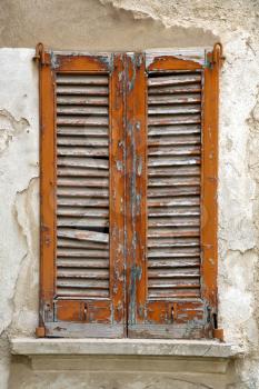 cavaria varese italy abstract  window      wood venetian blind in the concrete orange