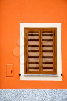  cavaria varese italy abstract  window      wood venetian blind in the concrete orange