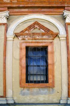  caronno varesino cross church varese italy the old rose window   and mosaic wall sunny day 