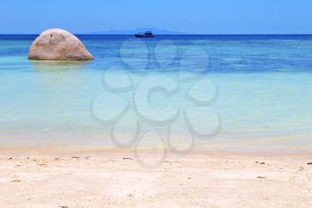 asia  kho tao  bay isle white  beach    rocks pirogue  in thailand and south china sea 
