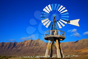 house africa wind turbines and the sky in  isle of lanzarote spain 
