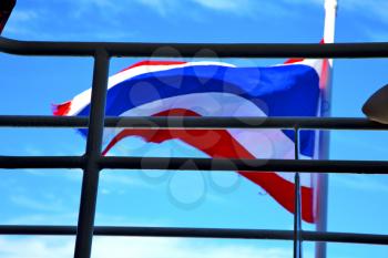 asia  kho samui bay isle waving flag    in thailand and  grate blue sky 