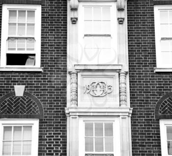 in europe london old red brick wall and      historical window