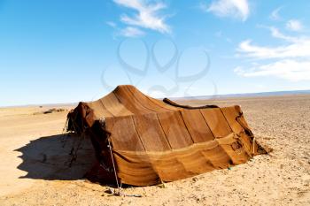 tent in  the desert of morocco sahara and rock  stone    sky
