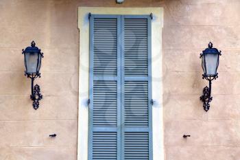 grey window   jerago    palaces italy   abstract  sunny day    wood venetian blind in the concrete  brick  
