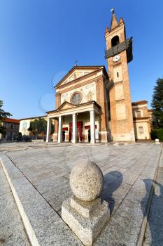 in  the parabiago old   church  closed brick tower sidewalk italy  lombardy  