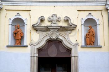  church door   in italy  lombardy   column  the milano old     closed brick  