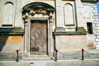   italy church santo antonino  varese  the old door entrance and mosaic sunny daY