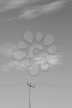  in the cloudy  sky and abstract background current pole     electricity line