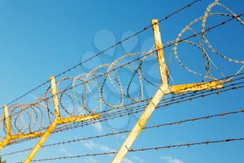 and cloudy sky in oman barbwire in the background 