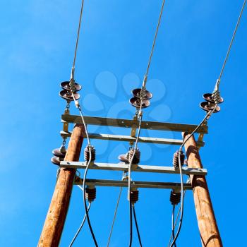  wood pylon energy and current line   in oman the electric cable